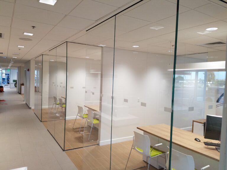 Glass-walled offices with frosted film bands