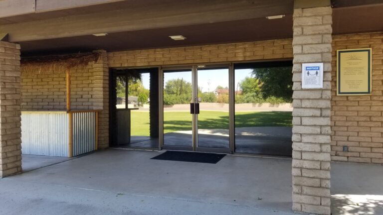 Building entry with tinted glass doors