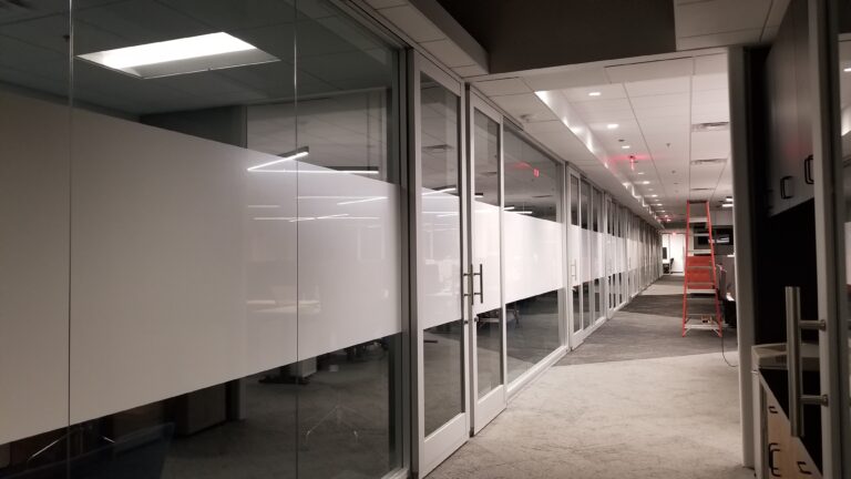 Frosted film band across glass offices