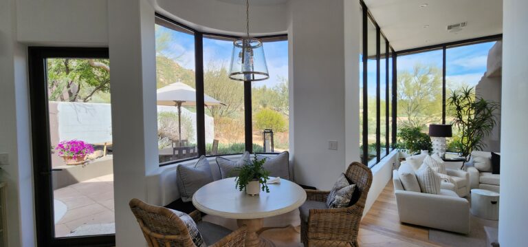 Dining nook with film on large windows