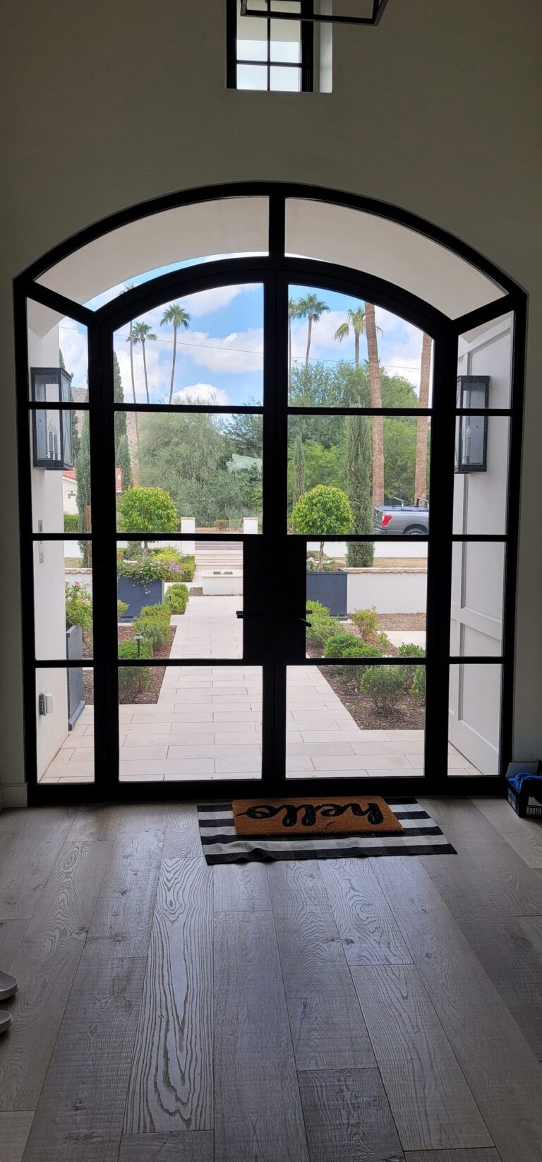 Arched French doors with window film