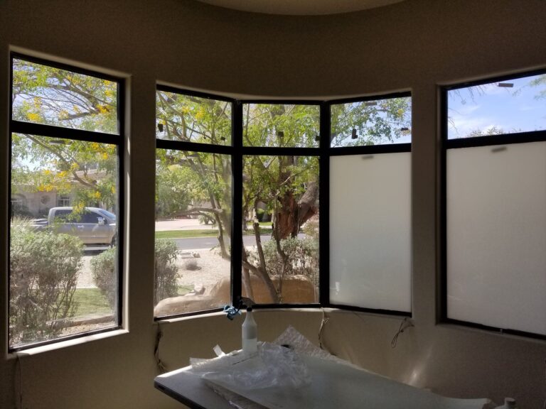 Bay windows in a home with window tint