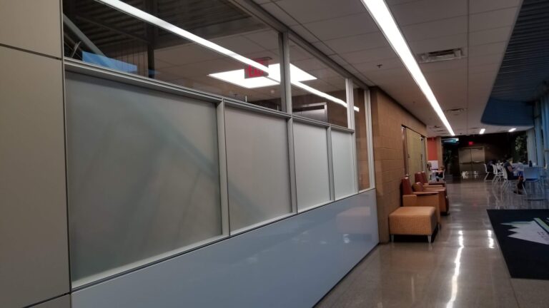 Hallway glass partition with frosted privacy film