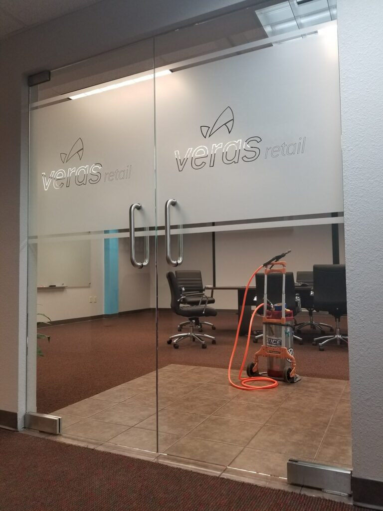 Frosted logo graphics on glass office doors