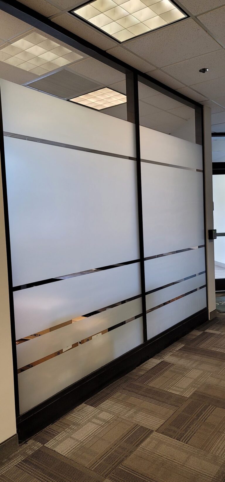 Office glass walls with frosted privacy film