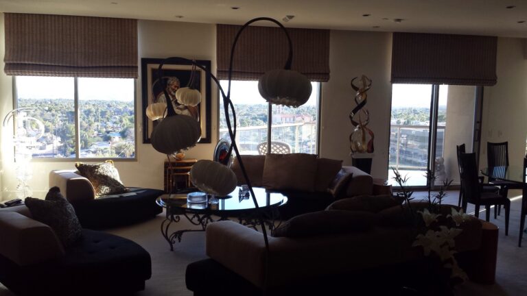 Living room with tinted windows overlooking the city