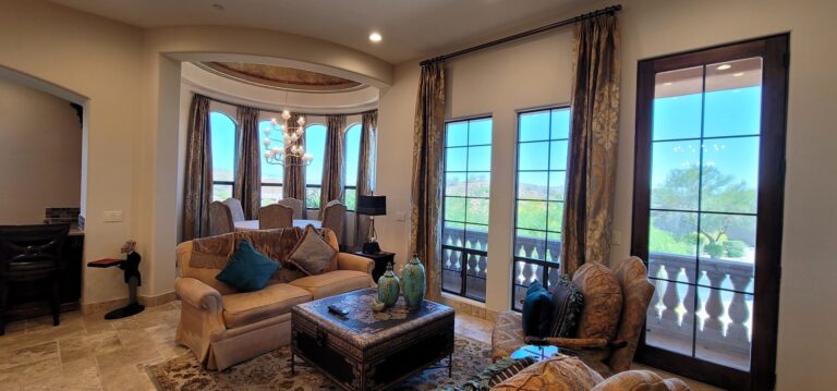 Living room with tinted arched windows