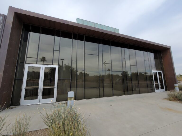 Modern commercial building with a tinted glass facade