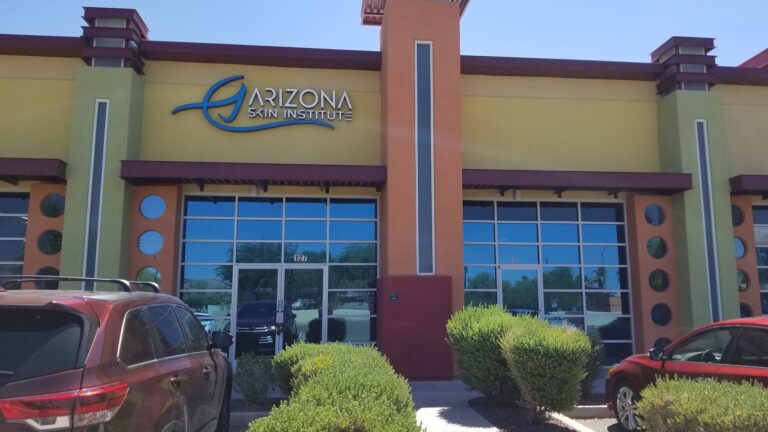 Retail building with tinted windows and entry
