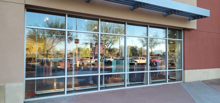 Shopping center storefront with tinted glass