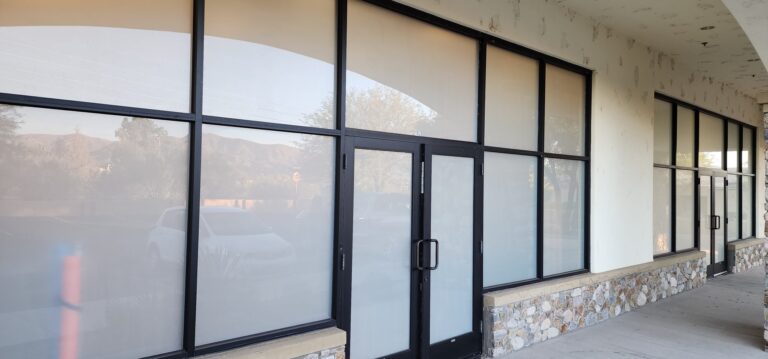 Storefront with frosted privacy film on the lower windows